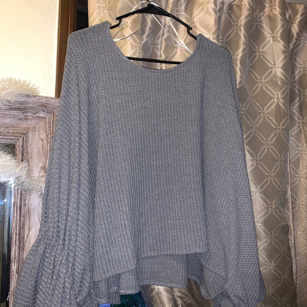 grey sweater with bell sleeves